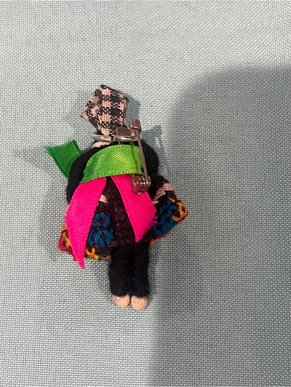 Handcrafted Multicolor Doll Brooch with Bright Green Accent